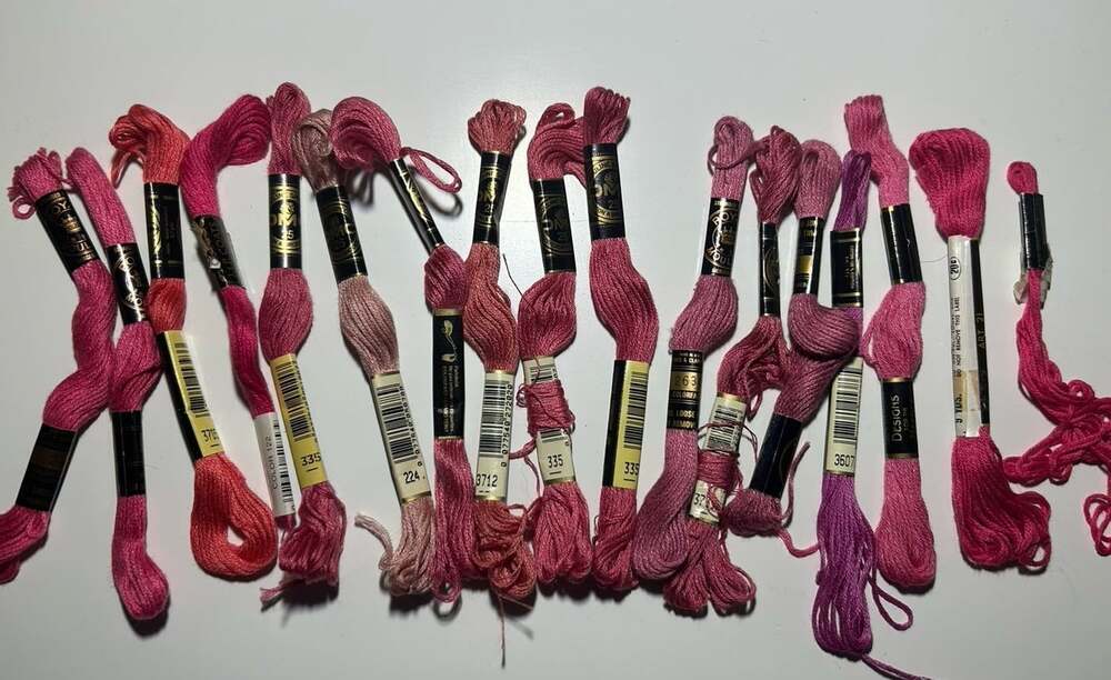 17 Skeins of assorted embroidery threads shades of pink